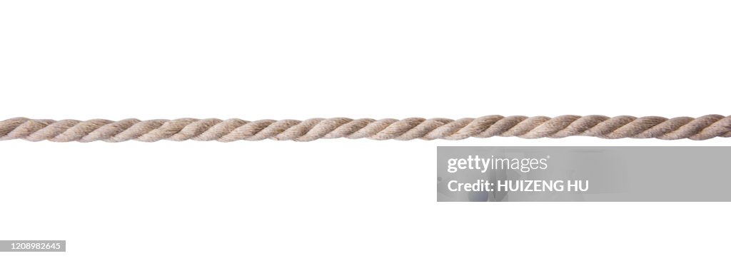 Close-up of rope part on white background