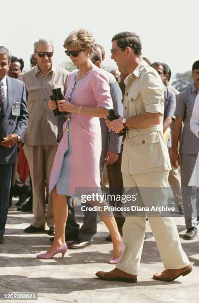 Prince Charles and Diana, Princess of Wales visit the Qutbi Shahi tomb in Hyderabad, India, 15th February 1992. Diana is wearing a pink dress by...