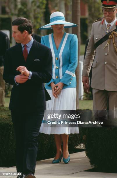 Prince Charles and Diana, Princess of Wales visit the Delhi War Cemetery in Delhi, India, 12th February 1992. Diana is wearing a blue and white suit...