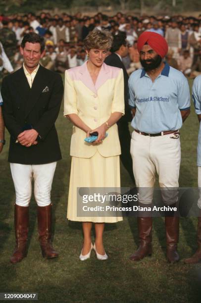 Prince Charles and Diana, Princess of Wales attend a polo match at the Rajasthan Polo Club in Jaipur, India, 13th February 1992. Diana is wearing a...
