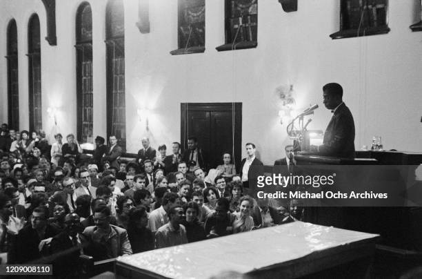 American novelist and activist James Baldwin addresses an audience in a church, USA, October 1963.