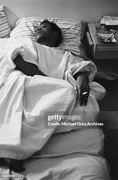 American novelist and activist James Baldwin in bed, USA, October 1963.