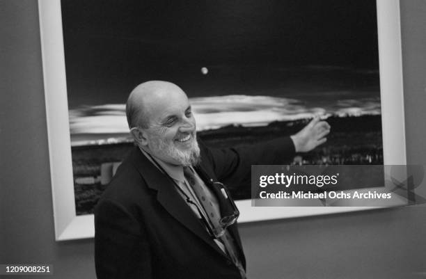 American landscape photographer Ansel Adams with his famous work 'Moonrise, Hernandez, New Mexico', November 1964. The photograph was taken in 1941.