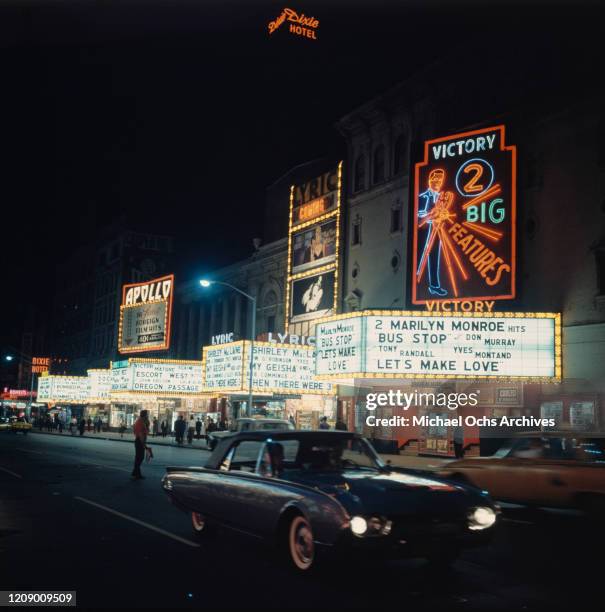 The Apollo, Lyric and Victory movie theatres on West 42nd Street, Manhattan, New York City, 1962. The Victory is showing the Marilyn Monroe double...
