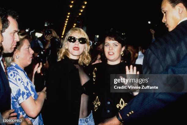 American singer Madonna and actress Rosie O'Donnell attend the New York premiere of the film 'A League of Their Own', USA, 25th June 1992. They both...
