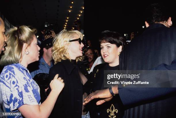 American singer Madonna and actress Rosie O'Donnell attend the New York premiere of the film 'A League of Their Own', USA, 25th June 1992. They both...