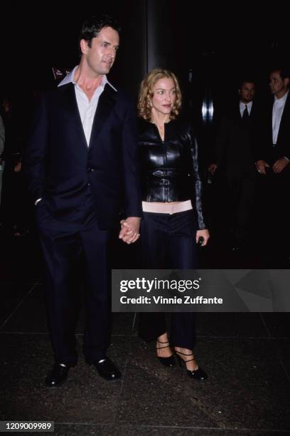 American singer Madonna with English actor Rupert Everett at the premiere of the film 'An Ideal Husband' in Hollywood, California, 10th June 1999.