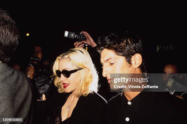 American singer Madonna with her boyfriend Tony Ward at the Martha Graham Dance Company's opening night gala in New York City, 2nd October 1990.