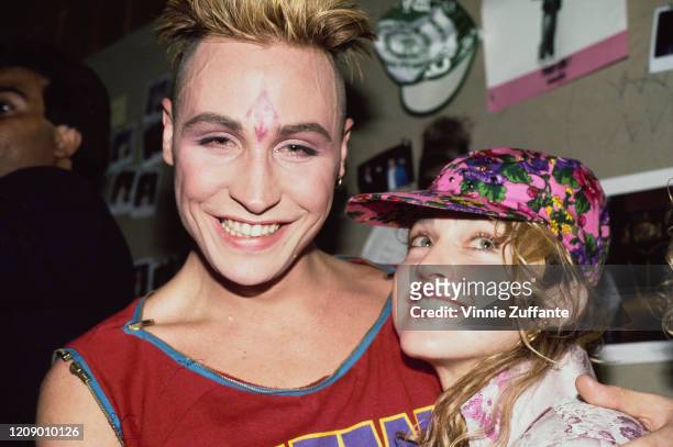 American singer Madonna and British singer Marilyn celebrate Boy George's birthday at the Palladium nightclub in New York City, 1985.