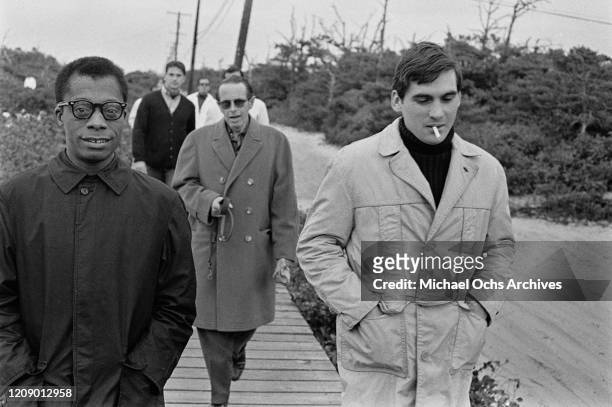 American novelist and activist James Baldwin with friends, USA, October 1963.