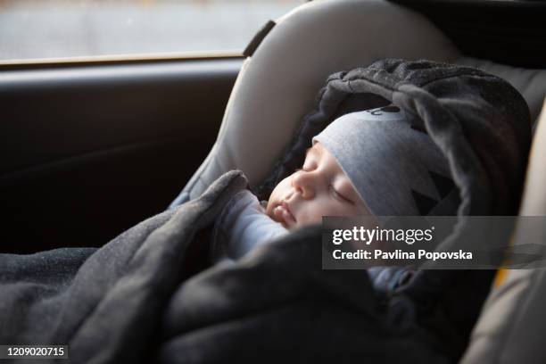 family travel - sleeping in car stock pictures, royalty-free photos & images