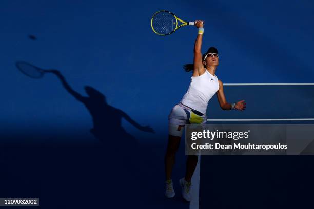 Zheng Saisai of China serves against Aryna Sabalenka of Belarus during Day 5 of the WTA Qatar Total Open 2020 at Khalifa International Tennis and...