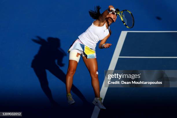 Zheng Saisai of China serves against Aryna Sabalenka of Belarus during Day 5 of the WTA Qatar Total Open 2020 at Khalifa International Tennis and...