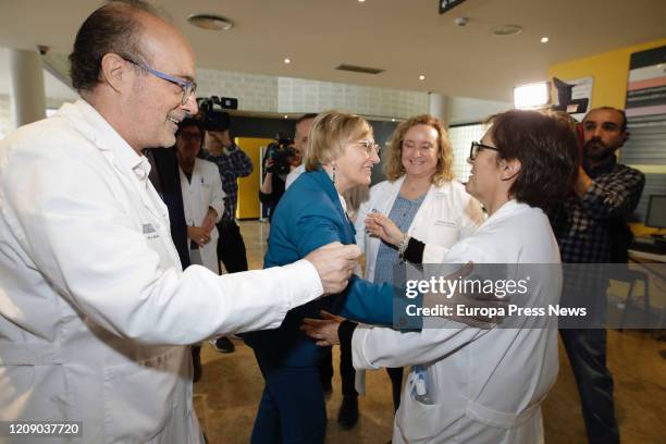 The hospital manager, Miguel Rovira and the counsellor of Health, Ana Barcelo embrace during their visit to the La Plana de Castellon Villarreal...