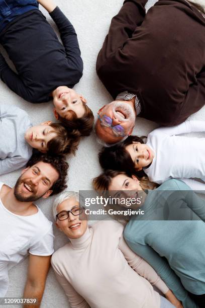 big family - children circle floor stock pictures, royalty-free photos & images