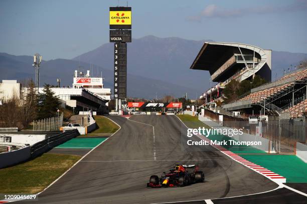 General view as Alexander Albon of Thailand driving the Aston Martin Red Bull Racing RB16 approaches turn one during Day Two of F1 Winter Testing at...