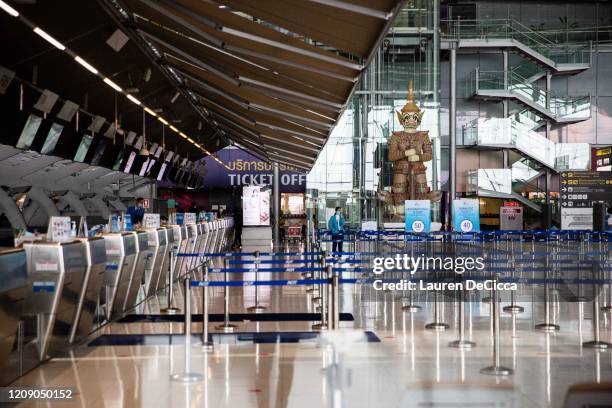 View of an empty Suvarnabhumi Airport departure hall after Thailand's government announced that the country would be suspending all international...