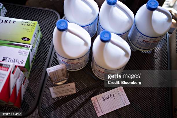 Bottles of bleach sit for sale, where proceeds go to staff members, at Chef Geoff's restaurant in Washington, D.C., U.S., on Thursday, March 26,...