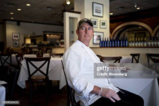 Restauranteur Geoff Tracy sits for a photograph at Chef Geoff's restaurant in Washington, D.C., U.S., on Thursday, March 26, 2020. As the wheels of...