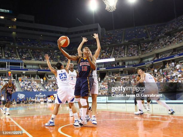 Tan White of the Indiana Fever shoots the ball against the New York Liberty at the 2008 Liberty Outdoor Classic on July 19, 2008 at Arthur Ashe...