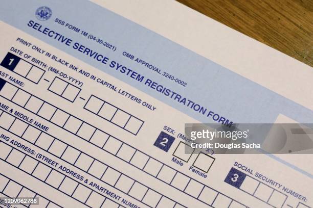 us selective service system application form for military conscription and draft for u.s. citizens - conscription stock pictures, royalty-free photos & images