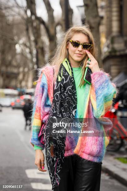 Jessica Minkoff wearing pastel colour mixed jacket, black leather pants, pink zebra heels, black acarf and pink zebra printed leather bag outside the...