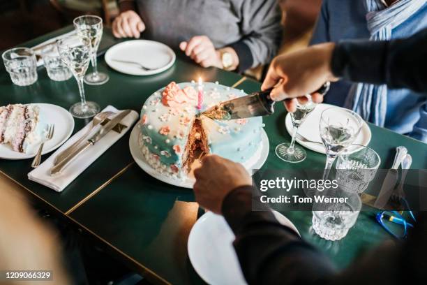 birthday cake being served in restaurant - cumpleaños tarta fotografías e imágenes de stock