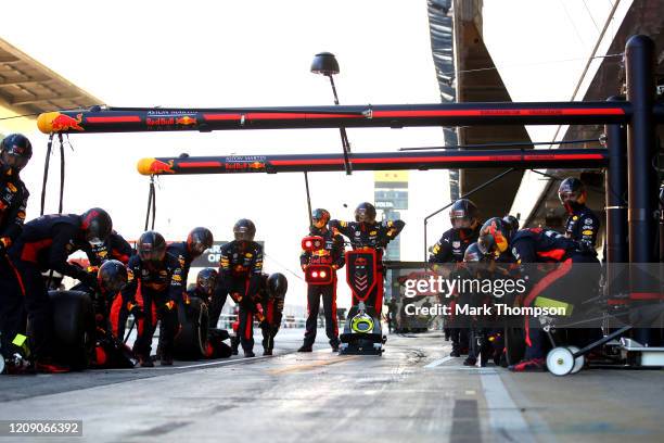 Red Bull Racing team members prepare for a pit stop during Day Two of F1 Winter Testing at Circuit de Barcelona-Catalunya on February 27, 2020 in...