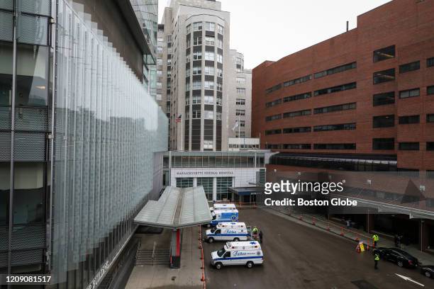 The main entrance to Massachusetts General Hospital remains empty after the hospital took initiatives to prohibit most visitors from visiting the...