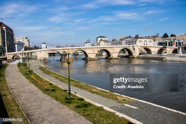 View of deserted Stone Bridge and Vardar River as part of coronavirus precautions in Skopje, North Macedonia on April 3, 2020.