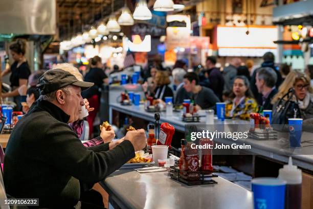 Diners eating lunch at the Reading Terminal Market in Philadelphia.