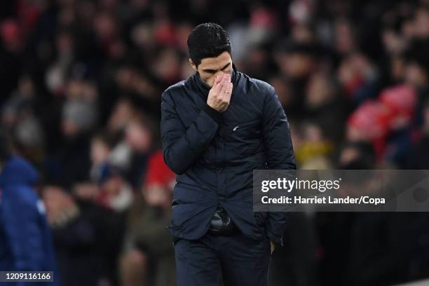 Mikel Arteta, Manager of Arsenal looks dejected after his team concede a second goal during the UEFA Europa League round of 32 second leg match...