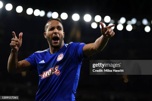 Youssef El Arabi of Olympiacos FC celebrates after scoring his team's second goal in extra-time during the UEFA Europa League round of 32 second leg...