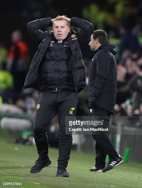 Celtic manager Neil Lennon reacts as his team suffer a 1 - 3 defeat during the UEFA Europa League round of 32 second leg match between Celtic FC and...