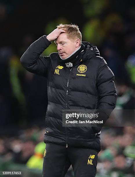 Celtic manager Neil Lennon reacts as his team suffer a 1 - 3 defeat during the UEFA Europa League round of 32 second leg match between Celtic FC and...