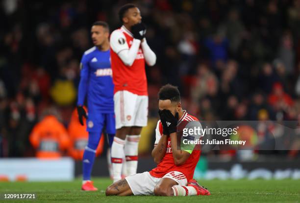 Pierre-Emerick Aubameyang of Arsenal looks dejected after his missed chance towards the end of time during the UEFA Europa League round of 32 second...
