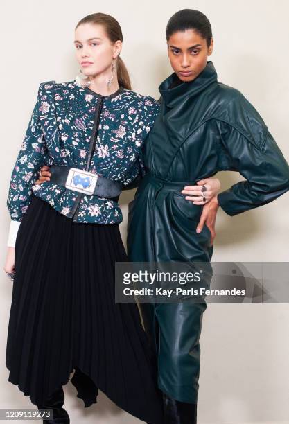 Models Luna Bijl and Imaan Hammam pose backstage in firstlooks before the Isabel Marant Womenswear Fall/Winter 2020/2021 show as part of Paris...