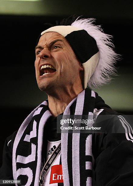 Collingwood supporter yells during the round 21 AFL match between the St Kilda Saints and the Collingwood Magpies at Etihad Stadium on August 12,...