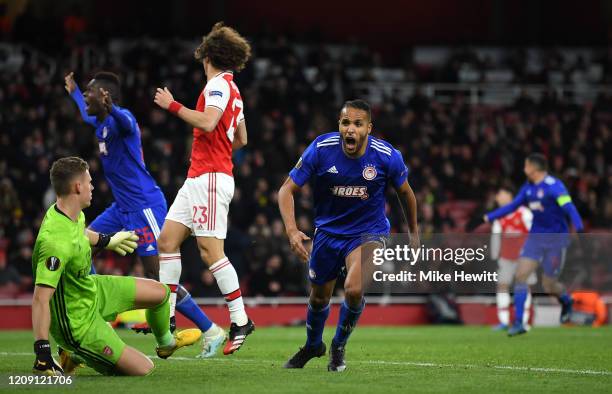 Youssef El Arabi of Olympiacos FC celebrates after scoring his team's second goal in extra-time during the UEFA Europa League round of 32 second leg...