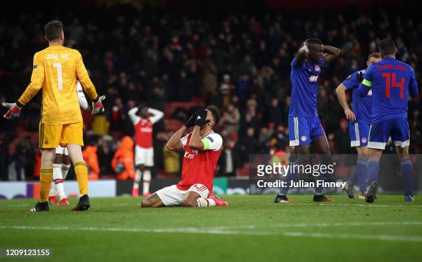 Pierre-Emerick Aubameyang of Arsenal looks dejected after his missed chance towards the end of time during the UEFA Europa League round of 32 second...