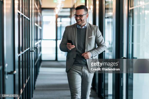 businessman texting - businessman stock pictures, royalty-free photos & images