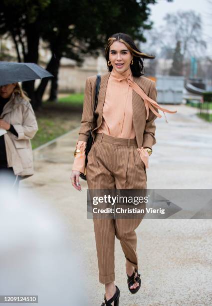 Brittany Xavier is seen wearing brown suit outside Chloe during Paris Fashion Week - Womenswear Fall/Winter 2020/2021 : Day Four on February 27, 2020...