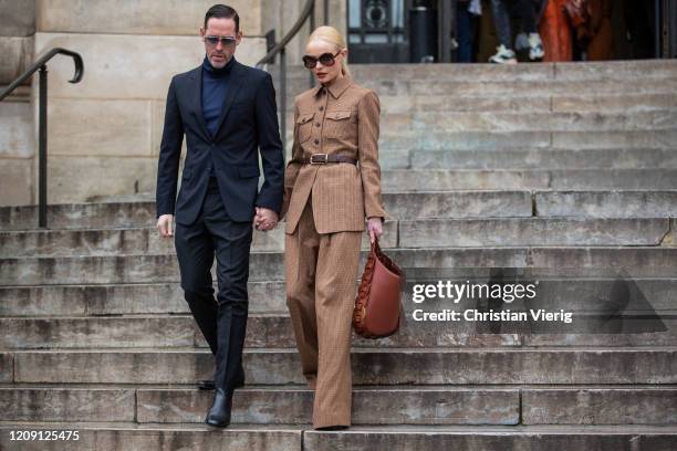 Couple Michael Polish and actress Kate Bosworth wearing brown coat is seen outside Chloe during Paris Fashion Week Womenswear Fall/Winter 2020/2021 :...