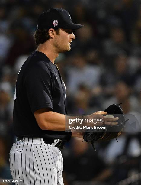 Gerrit Cole of the New York Yankees delivers a pitch in the first inning during the spring training game against the Pittsburgh Pirates at...