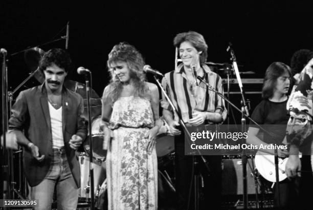 Musicians John Oates, Stevie Nicks, Daryl Hall and Rick Derringer perforn onstage for Todd Rundgren at the Roxy Theatre in 1978 for the recording of...