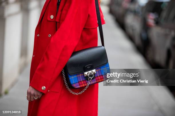 Denise Buschkühle is seen wearing red coat and bag Mulberry, denim jeans Goldsign during Paris Fashion Week - Womenswear Fall/Winter 2020/2021 : Day...