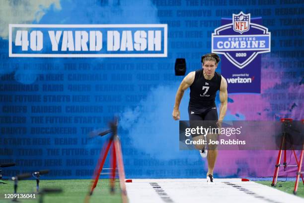 Quarterback Justin Herbert of Oregon runs the 40-yard dash during NFL Scouting Combine at Lucas Oil Stadium on February 27, 2020 in Indianapolis,...