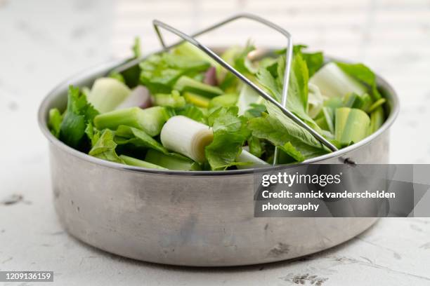 vegetables in wire basket - pressure cooker stock pictures, royalty-free photos & images