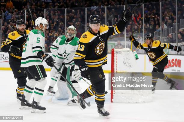 Charlie Coyle of the Boston Bruins celebrates after scoring a goal against the Dallas Stars during the first period at TD Garden on February 27, 2020...