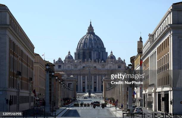 The Via della Conciliazione, that connects Saint Peter's Square to the Castel Sant'Angelo, completely deserted during the coronavirus emergency on...